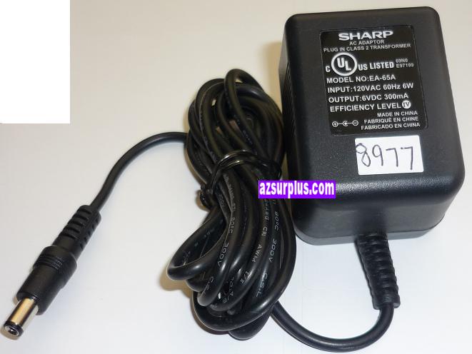 SHARP EA-65A AC ADAPTER 6VDC 300mA USED +(-) 2x5.5x9.6mm ROUND B