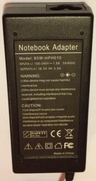 NOTEBOOK ADAPTER 65W-HPH010 18.5VDC 3.5A USED 1 x 5.2 x 7.3 x 12