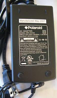 Polaroid MPA-6930A AC Adapter 9.5Vdc 3A USED -(+) 1.5x4mm 90° RO